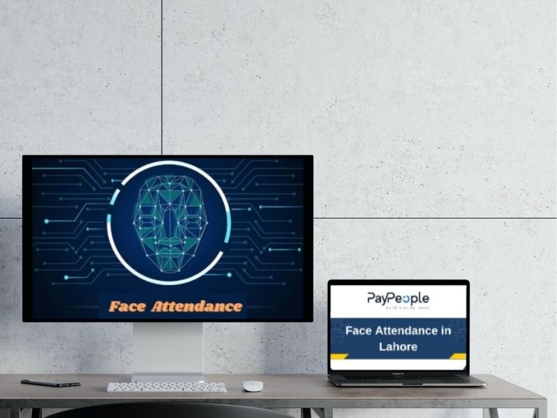 Modern office employees using biometric face attendance in Lahore for secure cloud-based payroll integration.